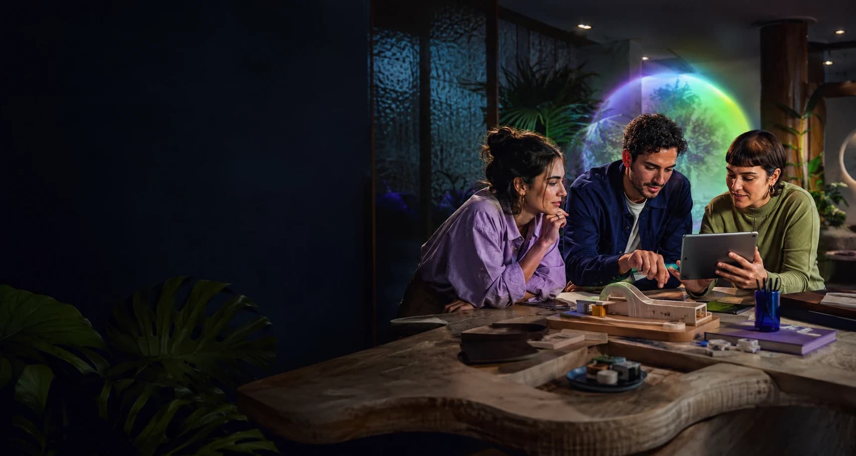 A Latin American team creating in a studio where artificial intelligence amplifies their work