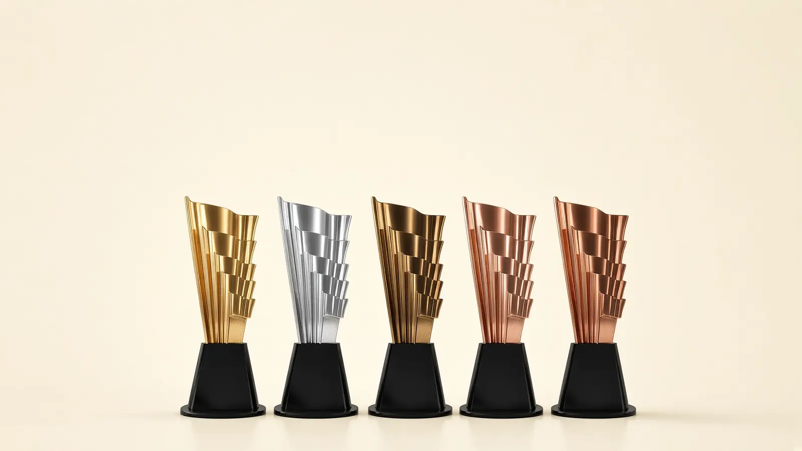 Representación editorial de trofeos metálicos en oro, plata y bronce